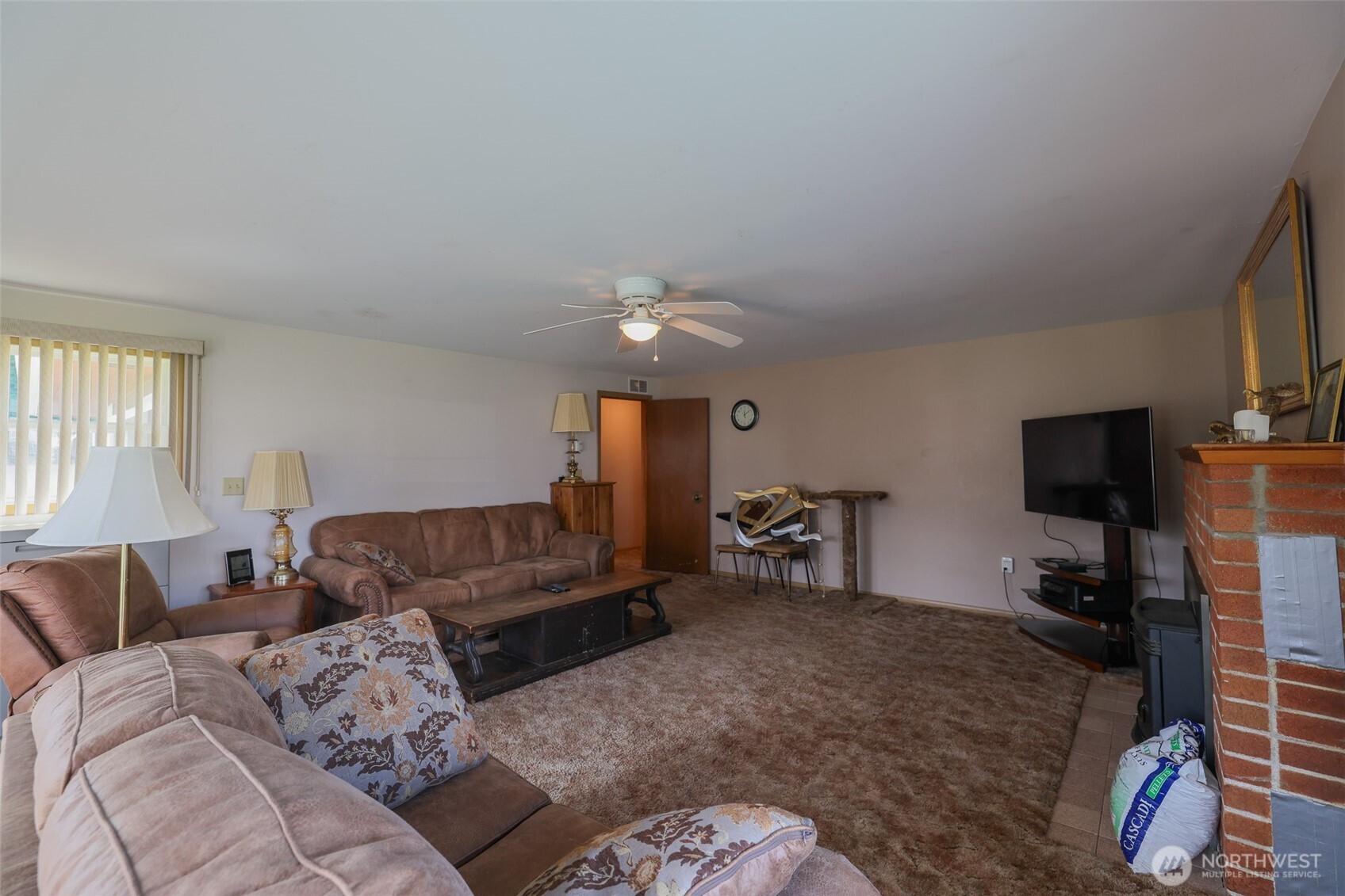 16110 178th Avenue Southeast Monroe, WA 98272 - Photo 11 of 35 a living room with furniture and a flat screen tv