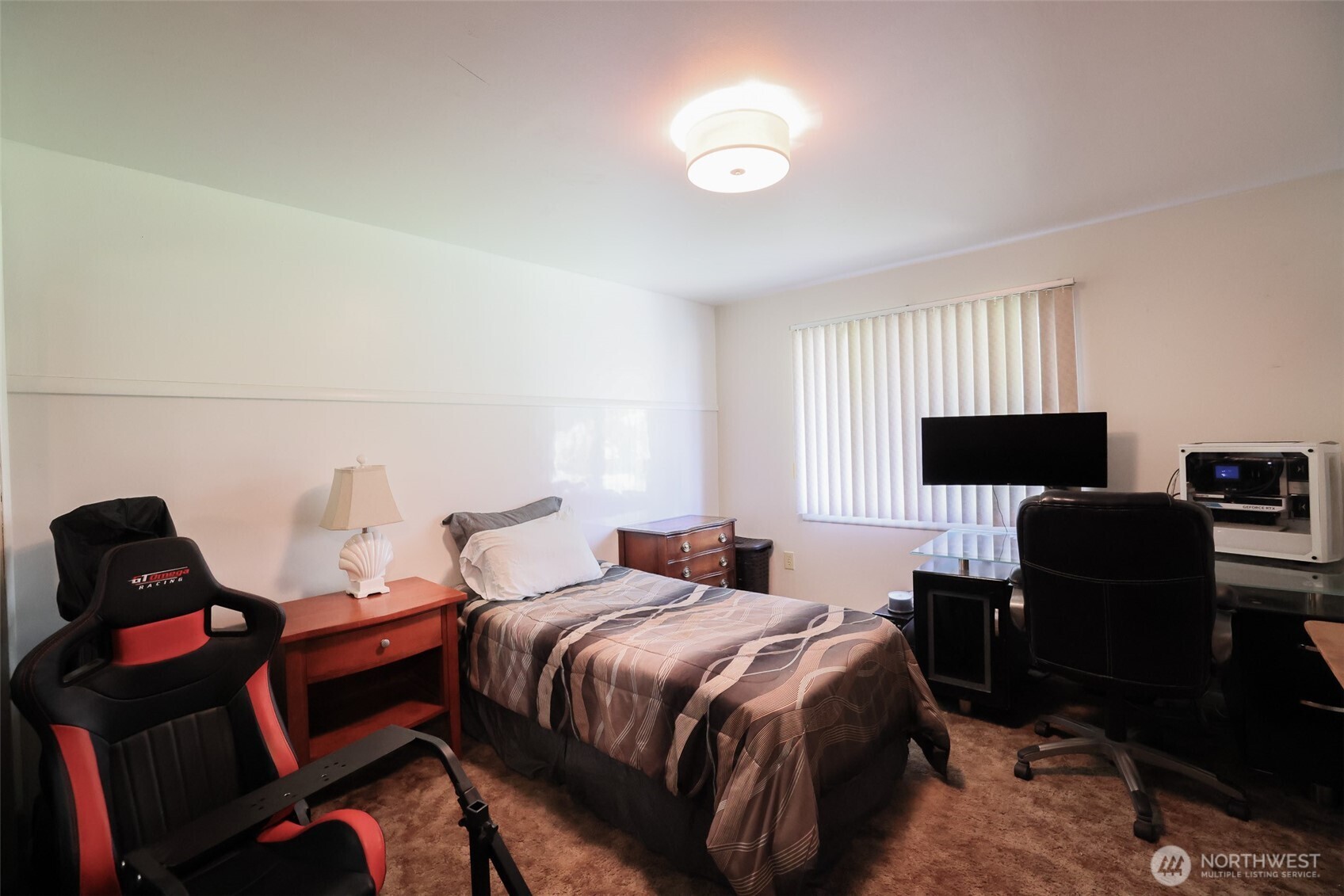 16110 178th Avenue Southeast Monroe, WA 98272 - Photo 17 of 35 a bedroom with a bed and a chair