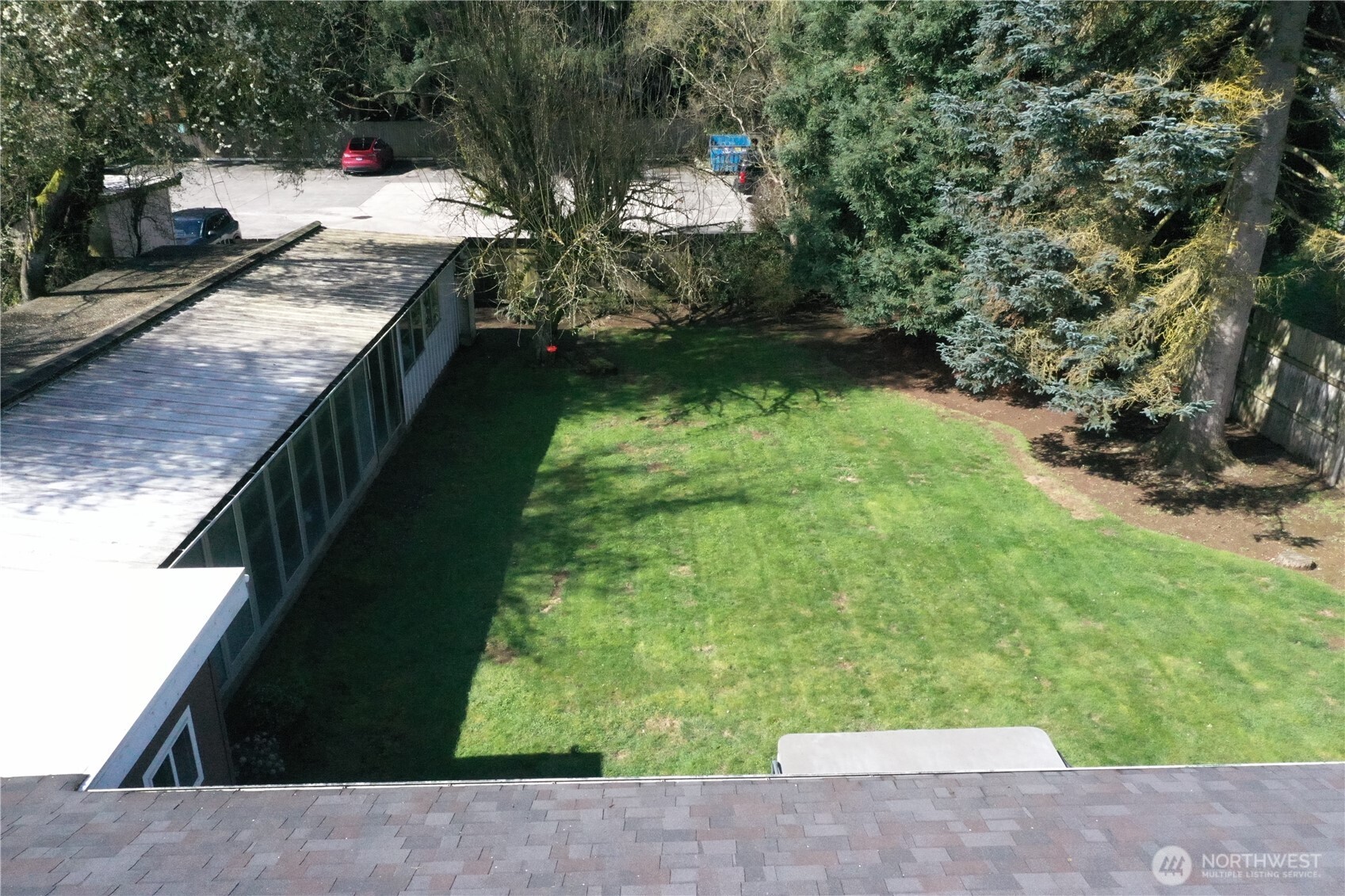 16110 178th Avenue Southeast Monroe, WA 98272 - Photo 34 of 35 a backyard of a house with a yard and potted plants