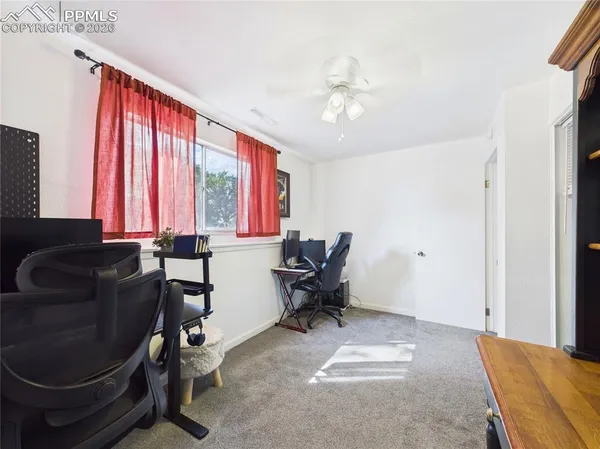 a workspace with chandelier