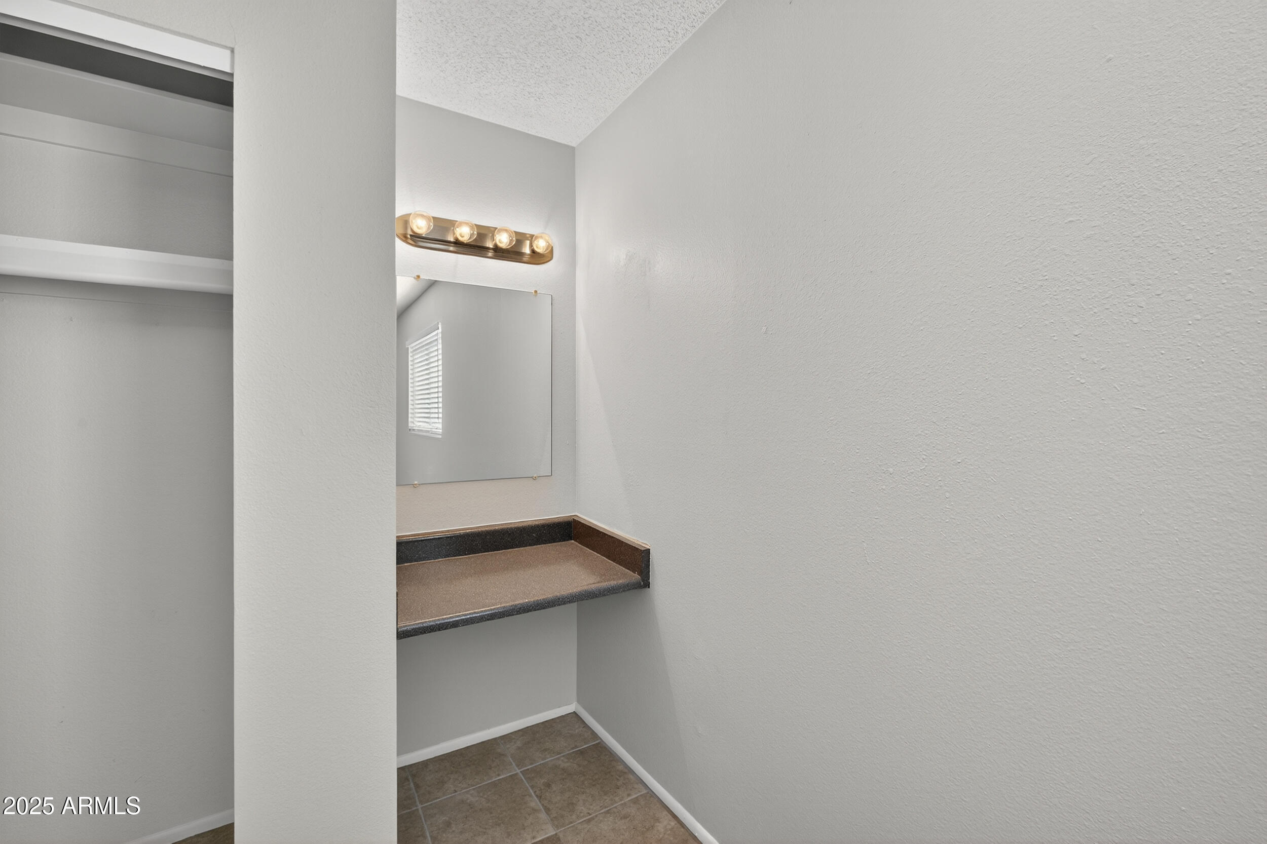 860 East Brown Road, Unit 66 Mesa, AZ 85203 - Photo 16 of 30 a view of an entryway with wooden floor