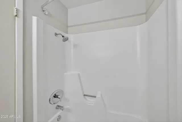 a view of a ceiling fan in a room