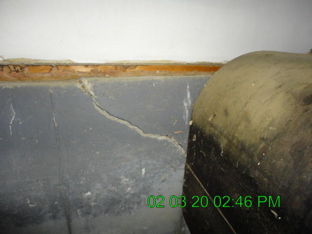 213 Parmenter Road Palermo, ME 04354 - Photo 23 of 26 23 Left side foundation cracked 1