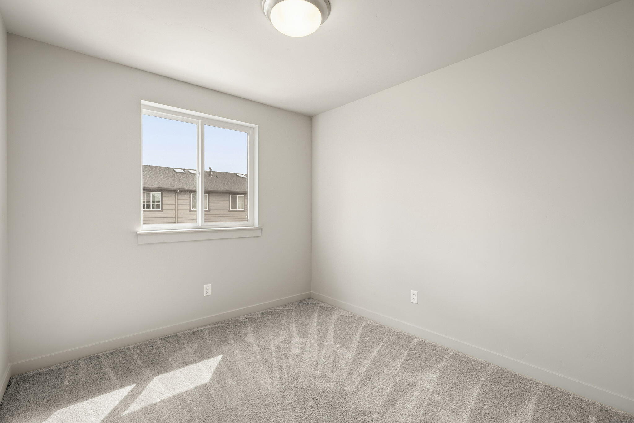 2366 Northeast Victor Place Bend, OR 97701 - Photo 20 of 31 a view of empty room with windows