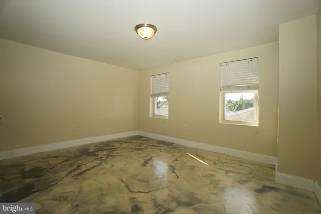 a view of an empty room with window