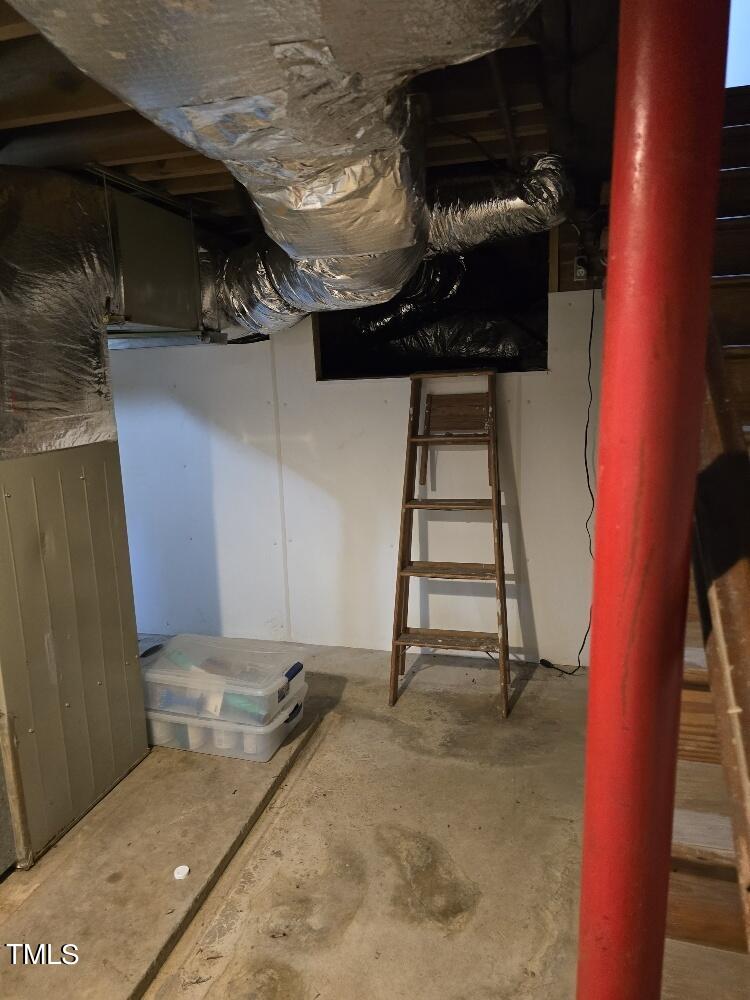 511 Providence Road Oxford, NC 27565 - Photo 38 of 56 Basement with concrete, sump pump, one part of duct work and access to under house. Has sump pump with battery backup. Also looks like another washer could go here