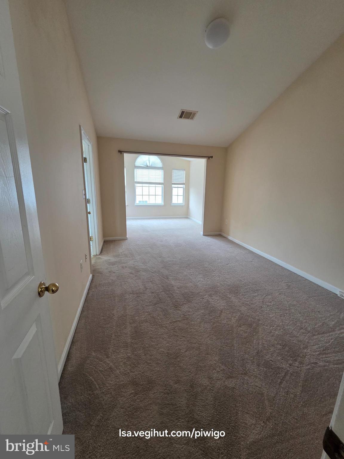 42856 Golf View Drive Chantilly, VA 20152 - Photo 11 of 23 wooden floor in an empty room with a window