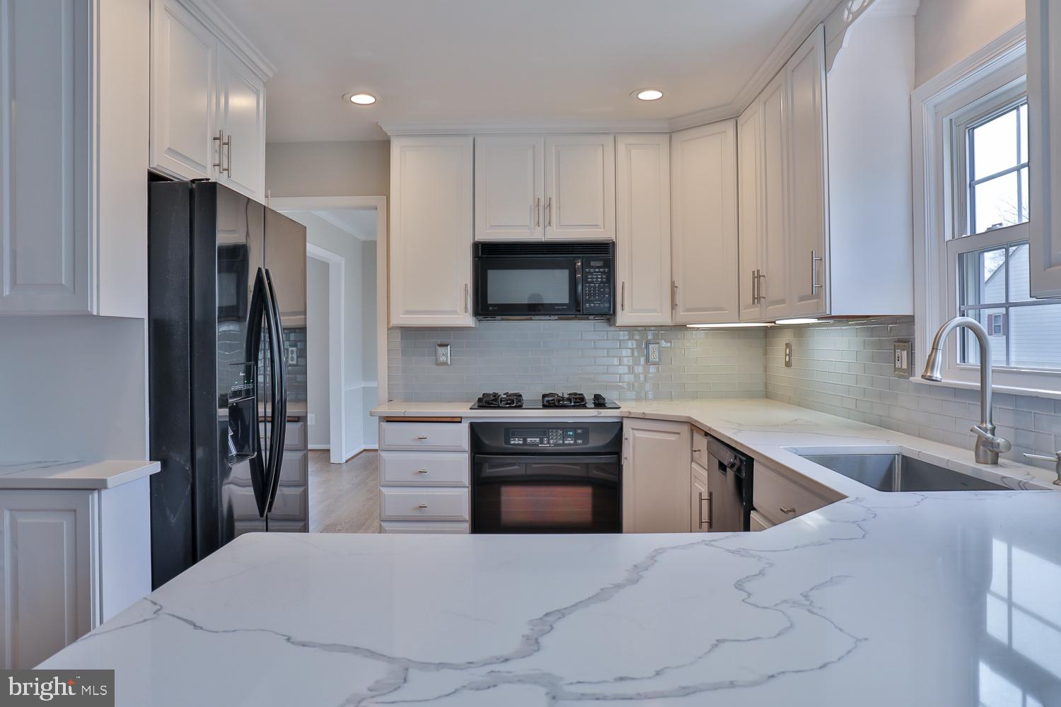 5423 Rilian Court Burke, VA 22015 - Photo 21 of 67 Modern kitchen with sleek finishes.