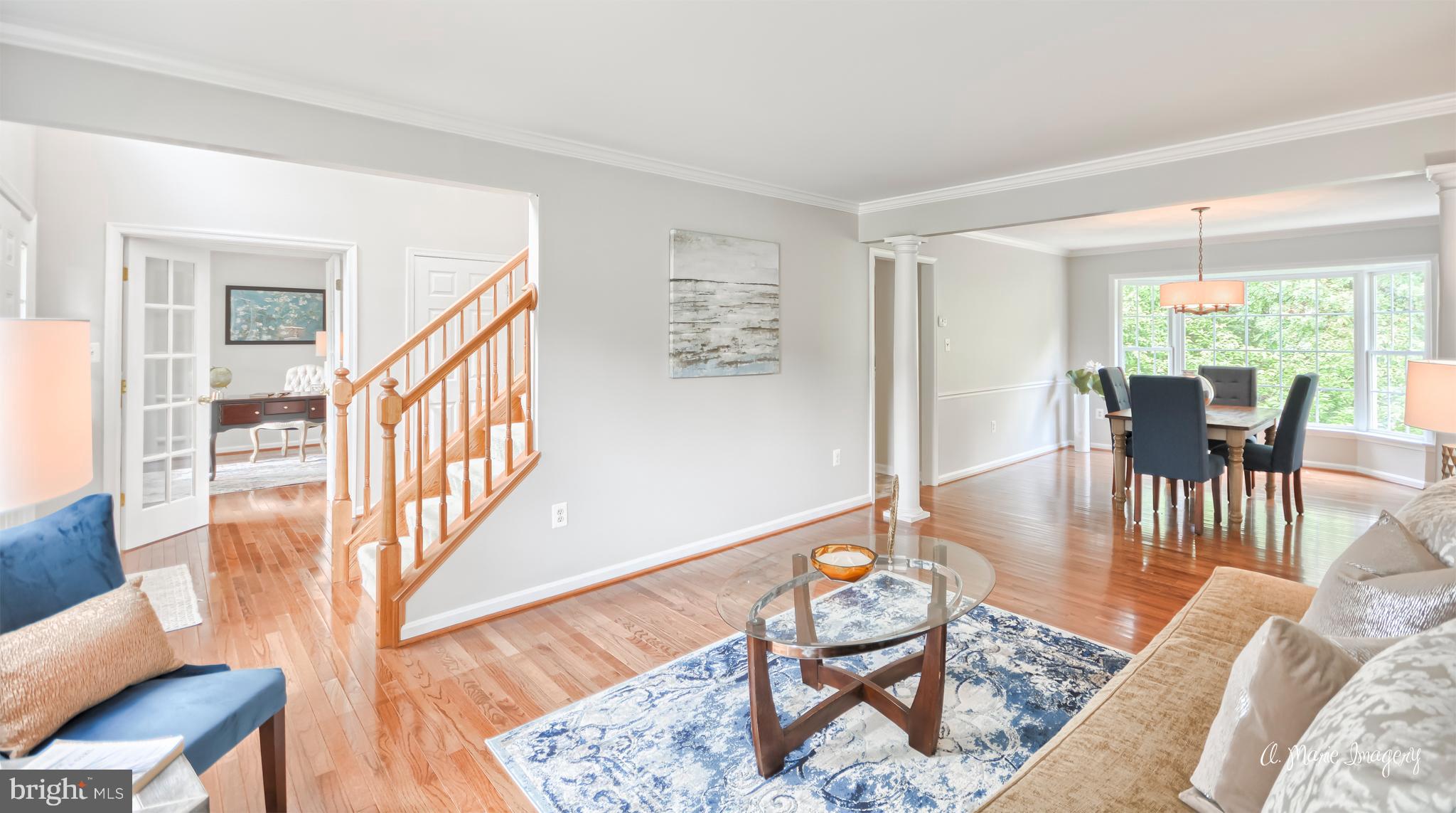 Foyer Leads to Spacious Living Room