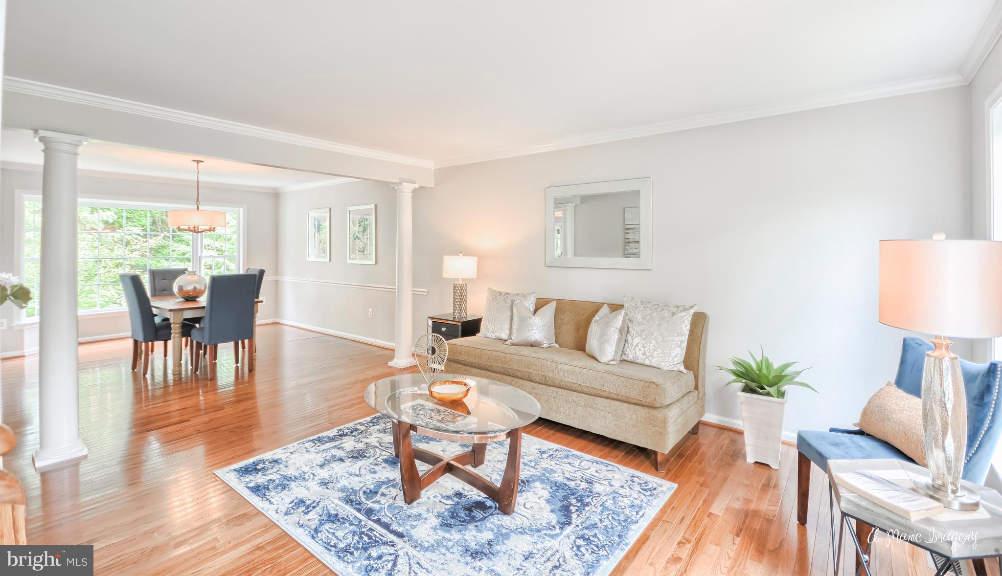 Living Room Opens to Airy Dining Room