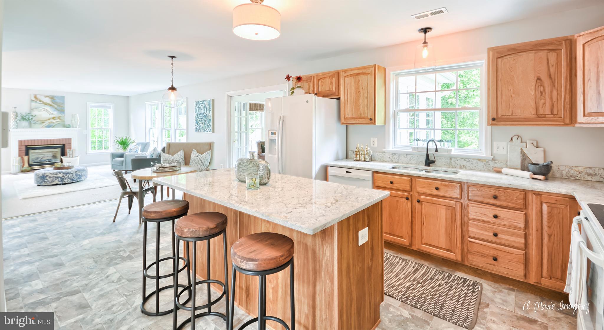 New Granite and Flooring in Kitchen
