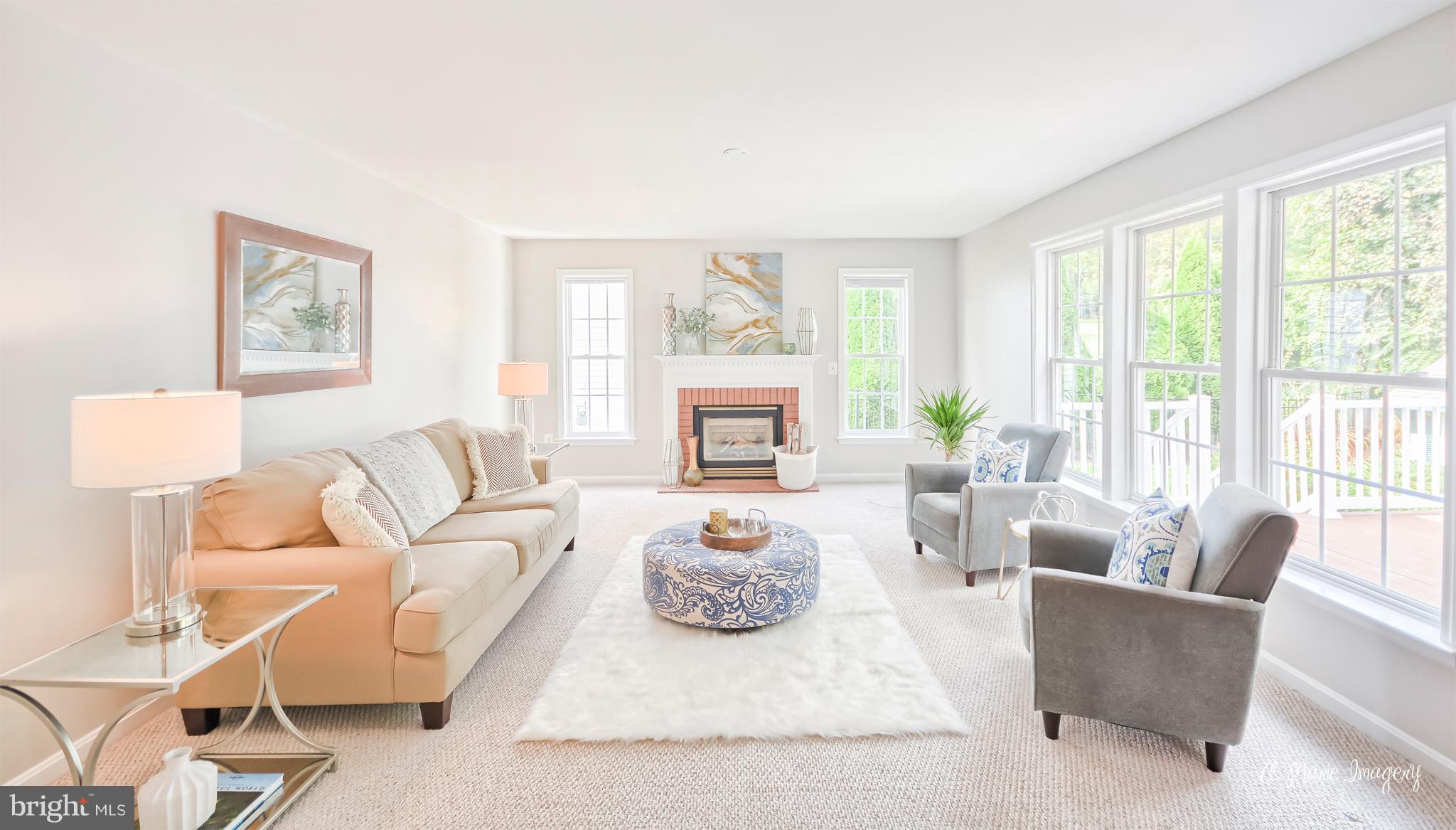 Light-filled Family Room Features Gas Fireplace