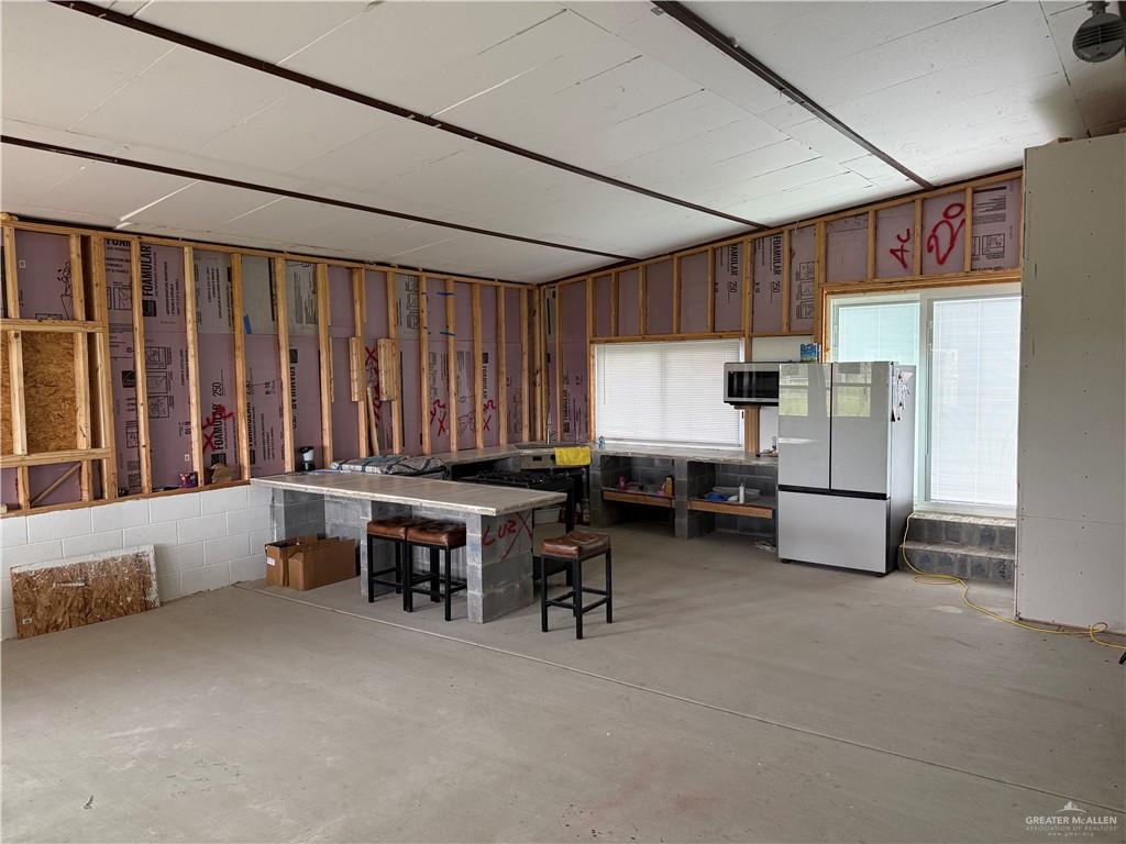 23265 Skinner Road Edcouch, TX 78538 - Photo 5 of 24 Spacious room with exposed wall studs and insulation
