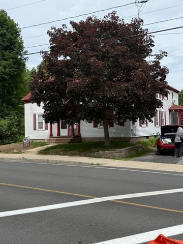 113 West Main Street, Unit 113 Ayer, MA 01432 - Photo 16 of 17 a view of street with houses and trees