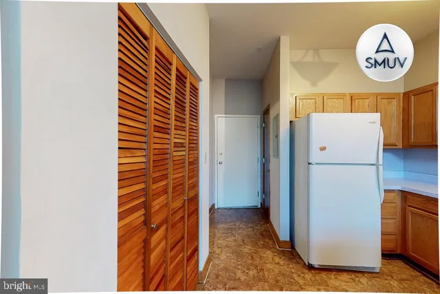 a view of a hallway with elevator