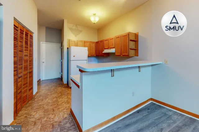 a view of a hallway with entryway