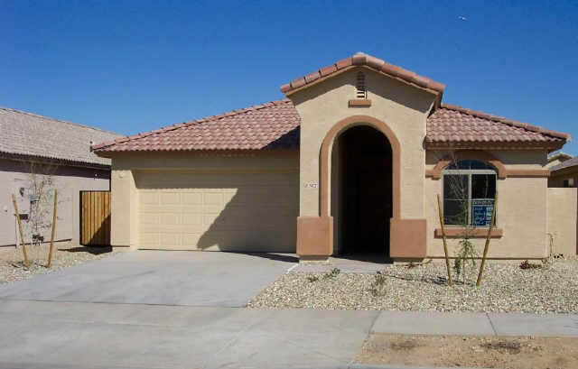 2422 West Gaby Road Phoenix, AZ 85041 - Photo 1 of 3 a front view of a house