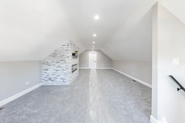 a view of an empty room and a hallway