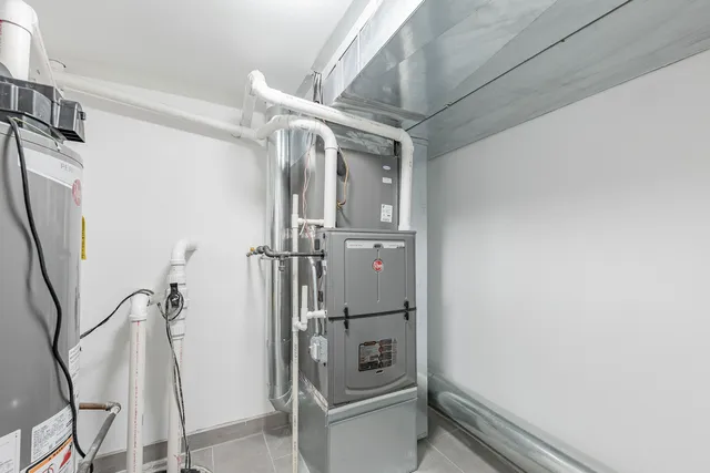 a view of a room with wooden floor and window