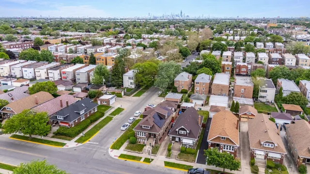 an aerial view of a city with lots of residential buildings
