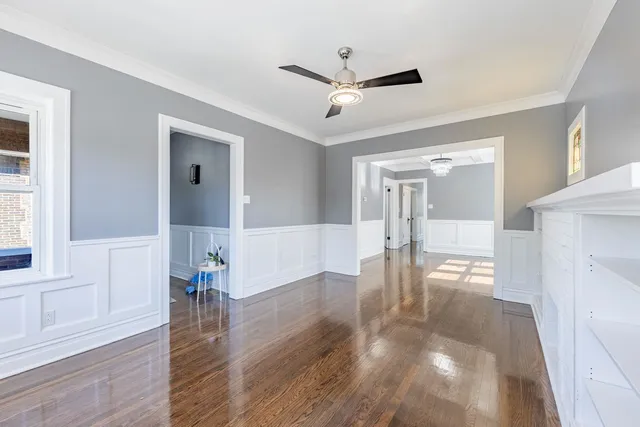 a view of a livingroom with wooden floor