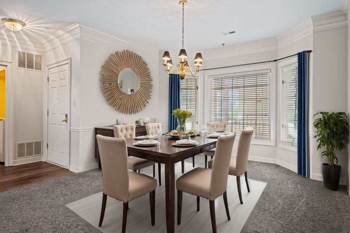 405 South Perkins Road, Unit 250 Memphis, TN 38117 - Photo 17 of 19 a view of a dining room with furniture and chandelier