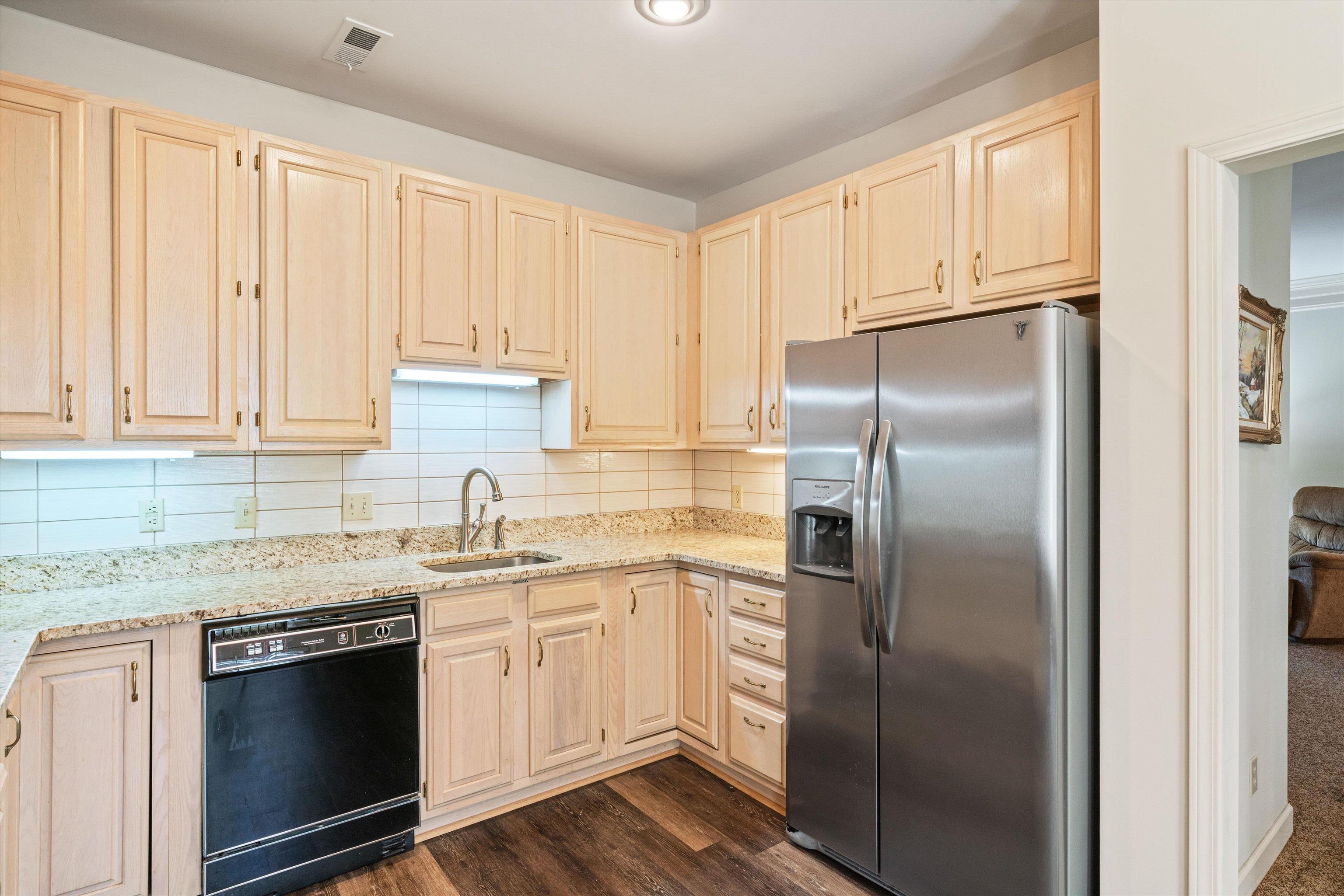 405 South Perkins Road, Unit 250 Memphis, TN 38117 - Photo 2 of 19 a kitchen with stainless steel appliances granite countertop a refrigerator sink and cabinets