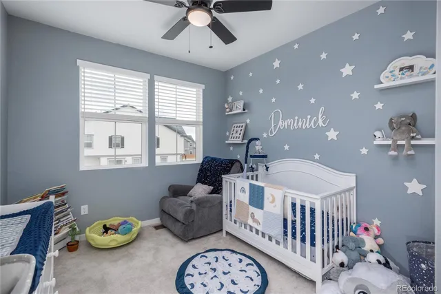 a bedroom with furniture and a table
