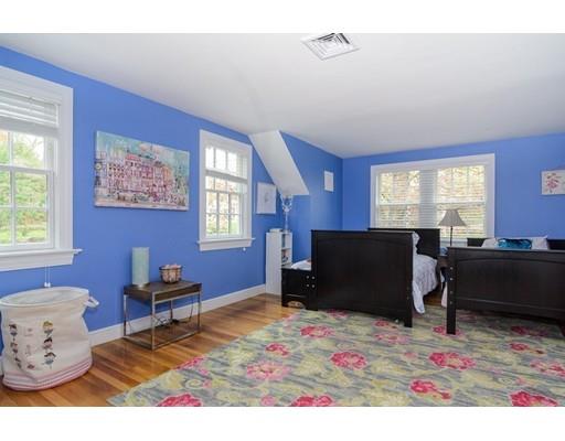 18 Ivy Road Wellesley, MA 02482 - Photo 16 of 21 a living room with furniture and a flat screen tv