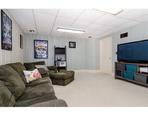 18 Ivy Road Wellesley, MA 02482 - Photo 18 of 21 a living room with furniture and a flat screen tv