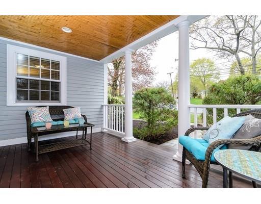 18 Ivy Road Wellesley, MA 02482 - Photo 2 of 21 a balcony with wooden floor and outdoor seating