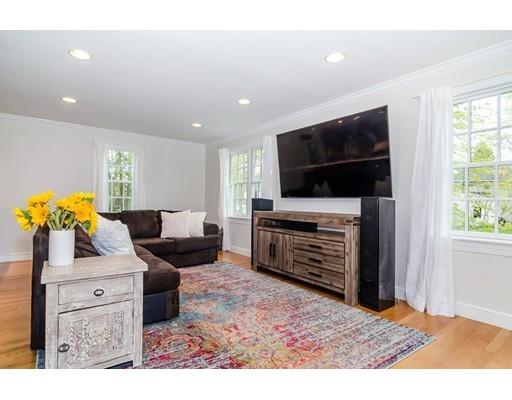 18 Ivy Road Wellesley, MA 02482 - Photo 6 of 21 a living room with furniture and a flat screen tv