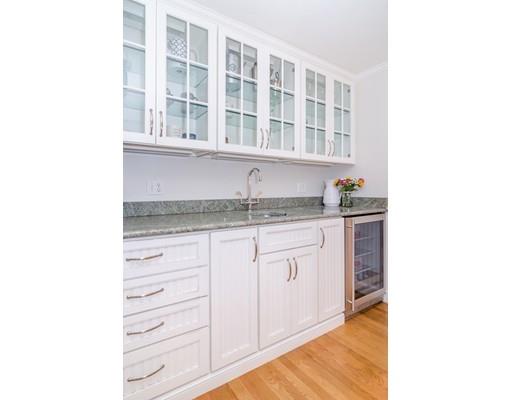 18 Ivy Road Wellesley, MA 02482 - Photo 9 of 21 a kitchen with a sink and cabinets