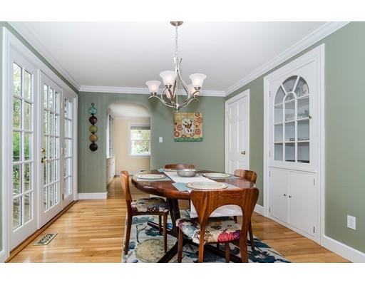 18 Ivy Road Wellesley, MA 02482 - Photo 10 of 21 a view of a dining room with furniture and chandelier