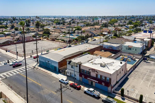 an aerial view of a building with outdoor space