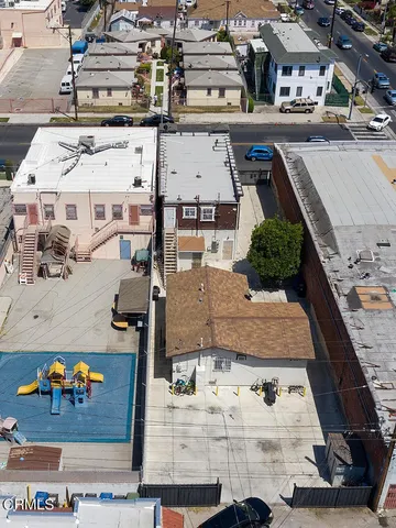 an aerial view of a building with outdoor space