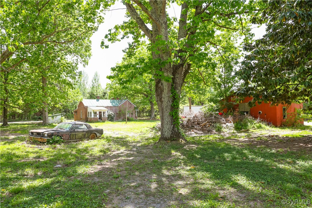 Tbd Abilene Road Farmville, VA 23901 - Photo 27 of 29 a backyard of a house with table and chairs