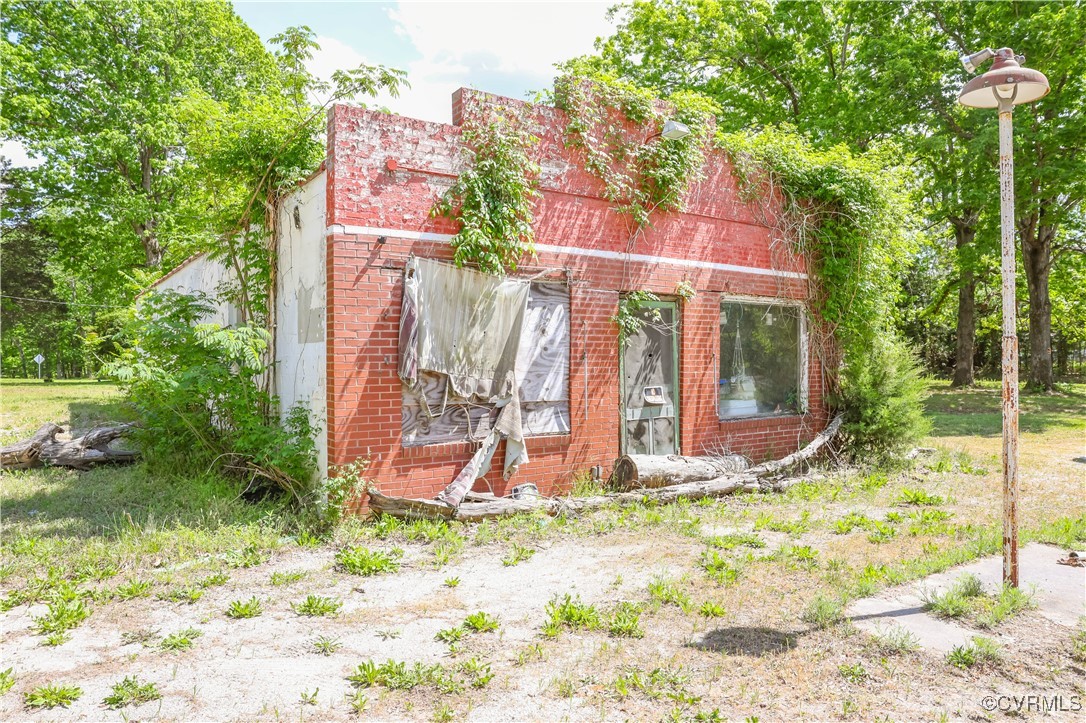 Tbd Abilene Road Farmville, VA 23901 - Photo 3 of 29 a view of a backyard with potted plants and large trees