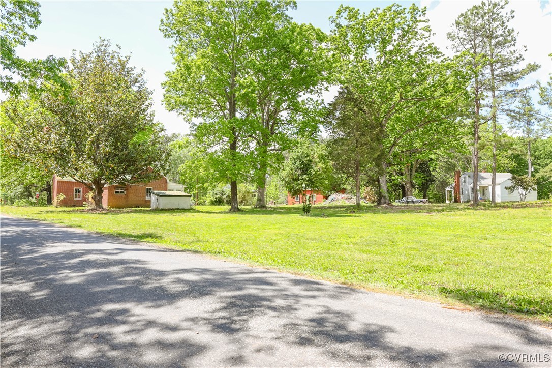 Tbd Abilene Road Farmville, VA 23901 - Photo 6 of 29 a view of a swimming pool and trees in the background