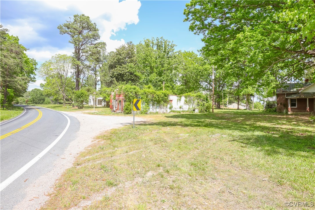Tbd Abilene Road Farmville, VA 23901 - Photo 8 of 29 a view of a house with large trees and a yard