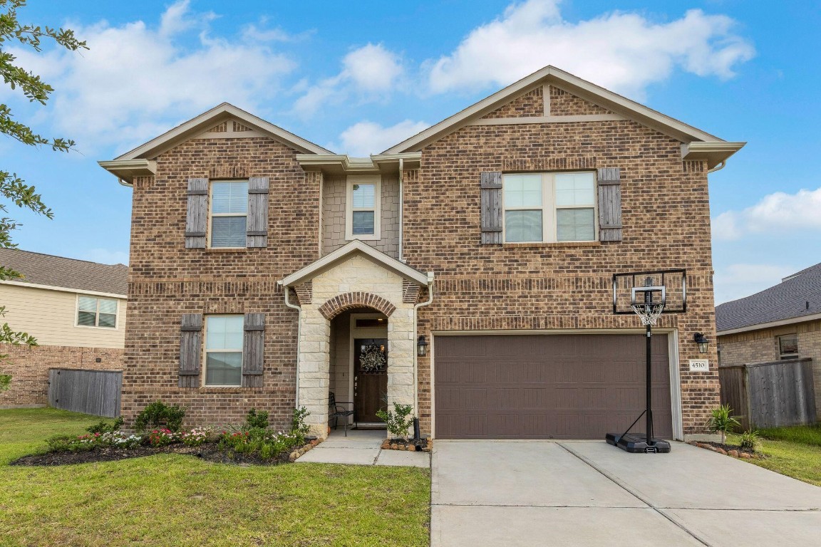 4510 Red Yucca Drive Baytown, TX 77521 - Photo 2 of 29 a front view of a house with garden