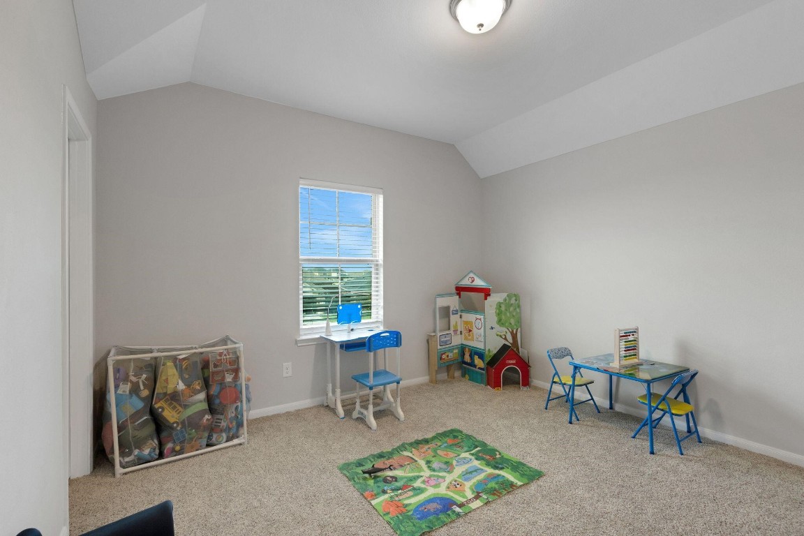 4510 Red Yucca Drive Baytown, TX 77521 - Photo 22 of 29 a living room with furniture and a wooden floor