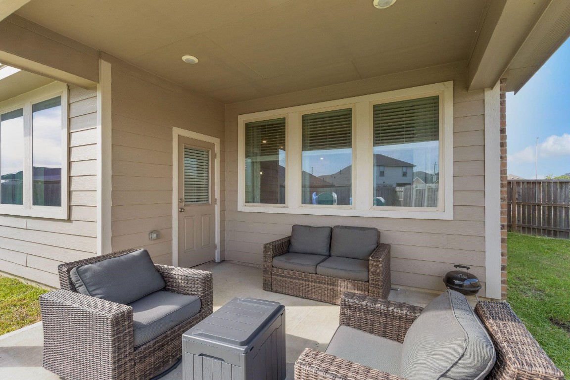 4510 Red Yucca Drive Baytown, TX 77521 - Photo 27 of 29 a outdoor living space with furniture and a window