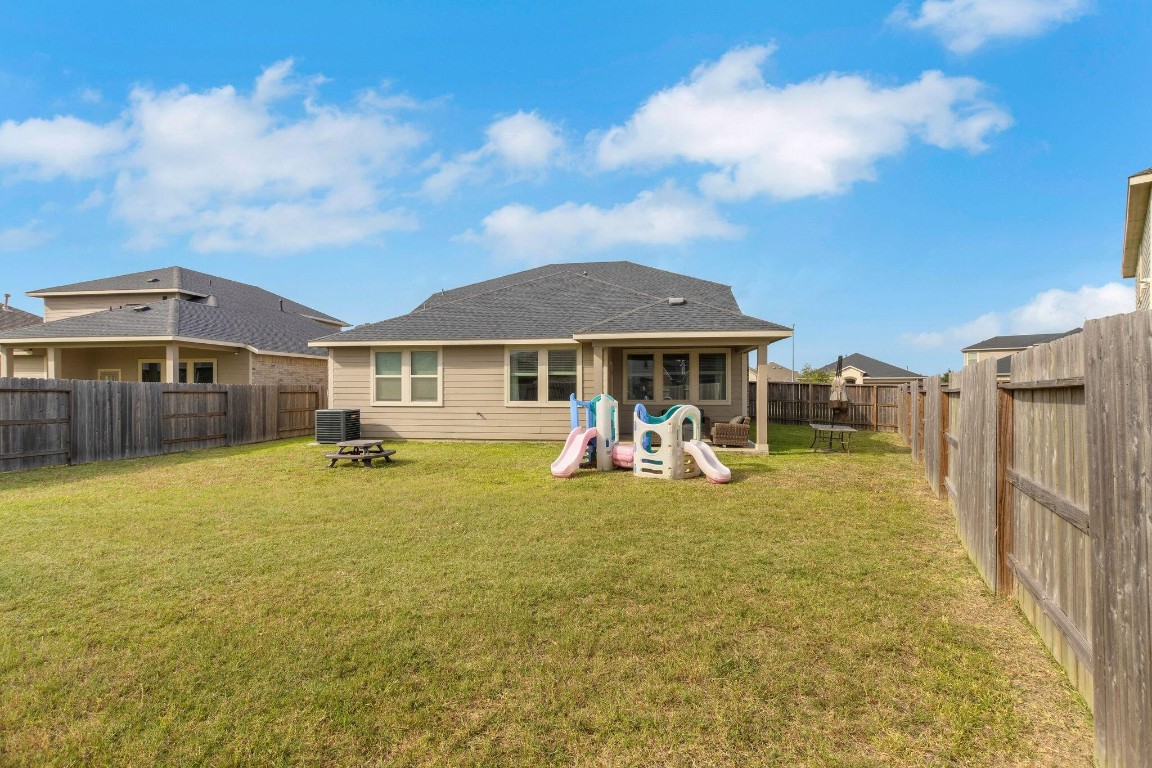 4510 Red Yucca Drive Baytown, TX 77521 - Photo 28 of 29 a view of a house with backyard porch and sitting area