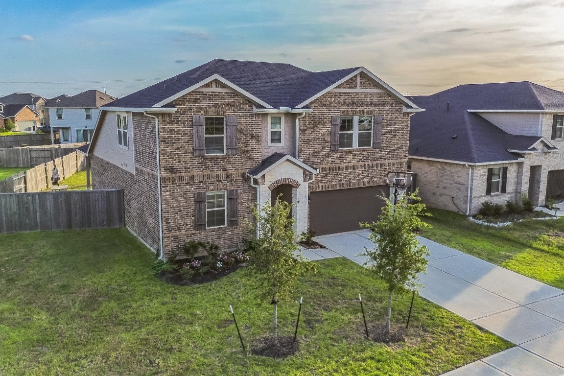 4510 Red Yucca Drive Baytown, TX 77521 - Photo 3 of 29 a front view of a house with garden