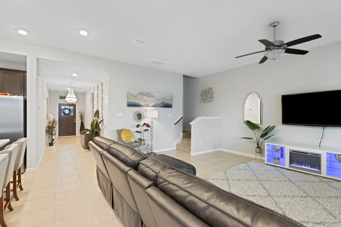4510 Red Yucca Drive Baytown, TX 77521 - Photo 6 of 29 a living room with furniture and a flat screen tv