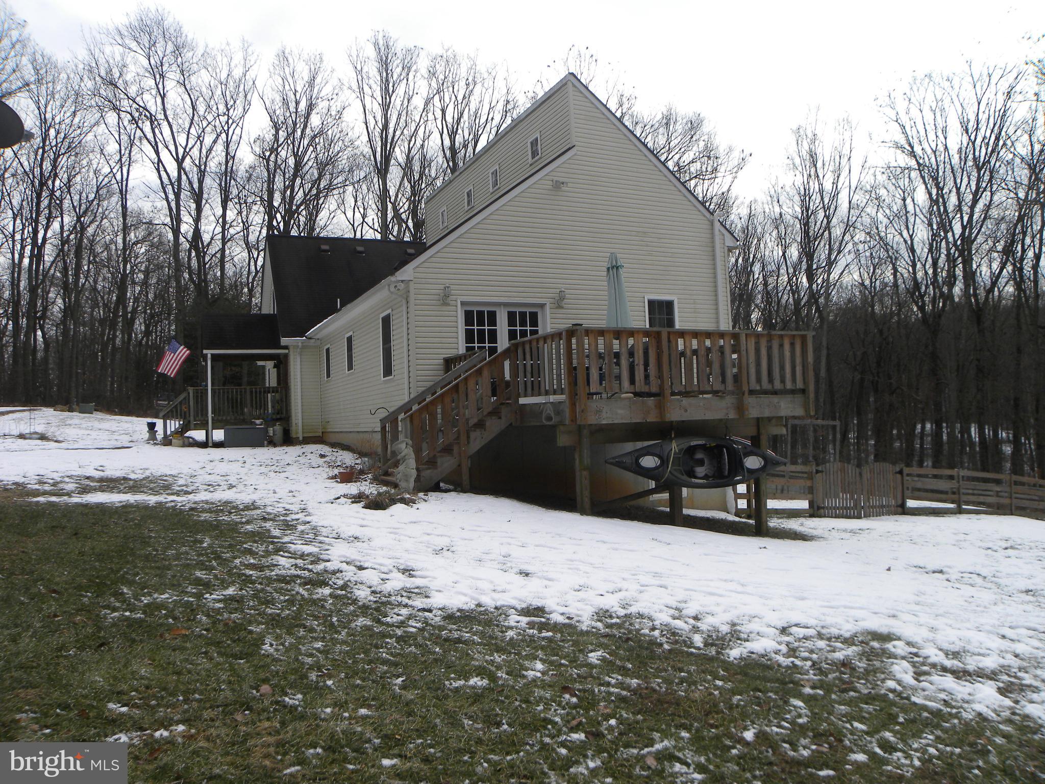 3906 Hooper Road New Windsor, MD 21776 - Photo 3 of 12 Side view with decking