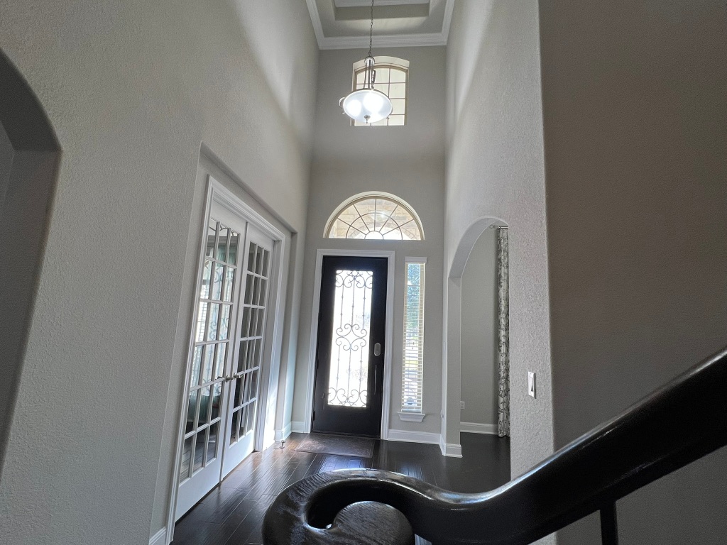 4121 Cappello Way Leander, TX 78641 - Photo 19 of 40 a view of entryway with livingroom and stairs