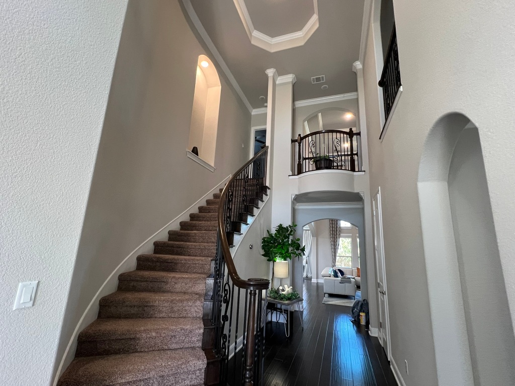 4121 Cappello Way Leander, TX 78641 - Photo 20 of 40 a view of entryway and hall with wooden floor