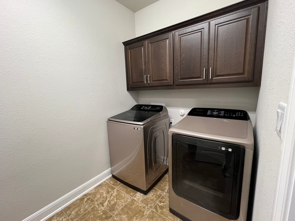 4121 Cappello Way Leander, TX 78641 - Photo 35 of 40 a utility room with dryer and washer